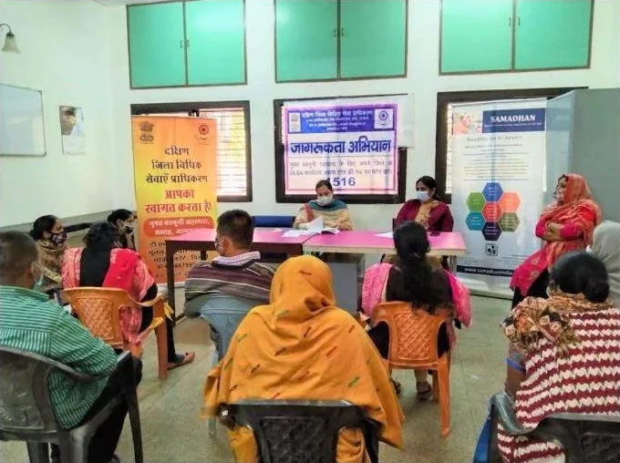 Parents at a legal awareness session in a classroom